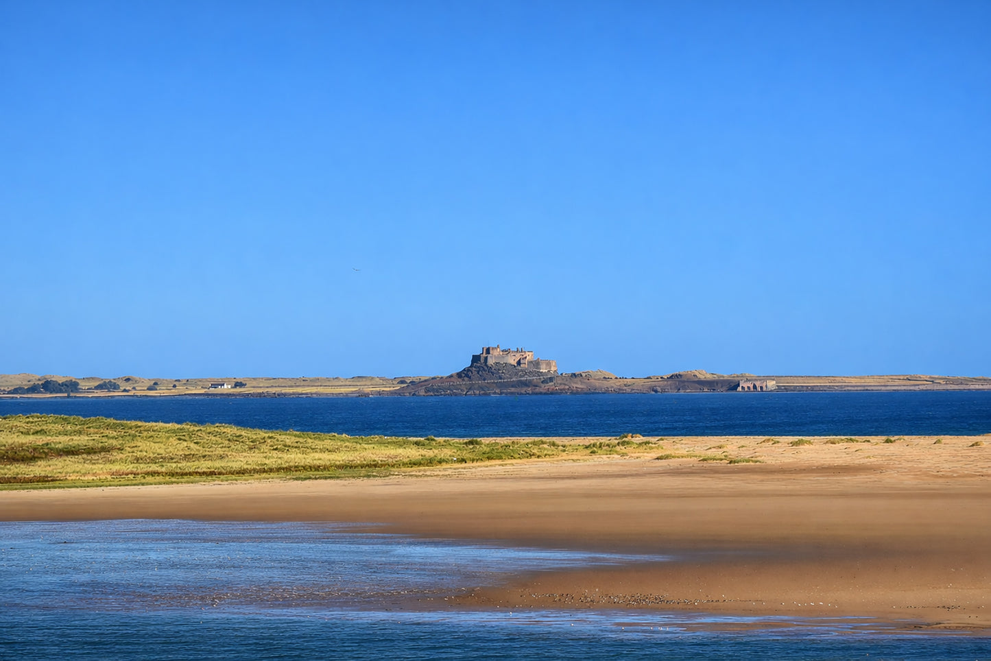 Budle Bay Beach and Lindisfarne Castle